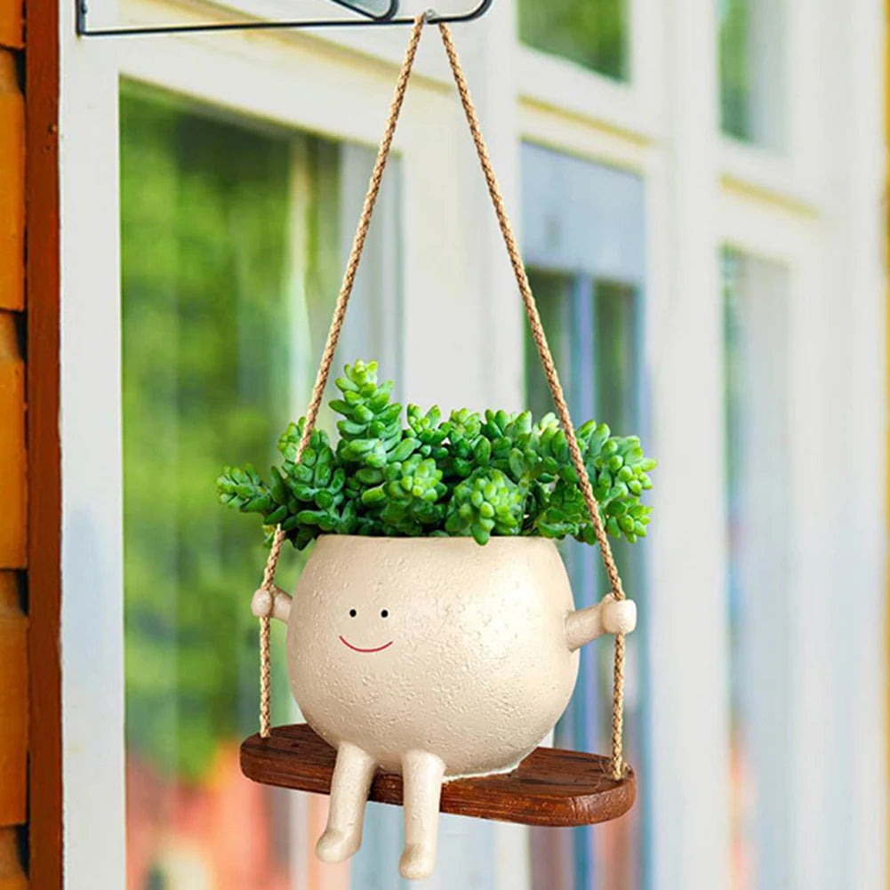 flower pot with smiling face