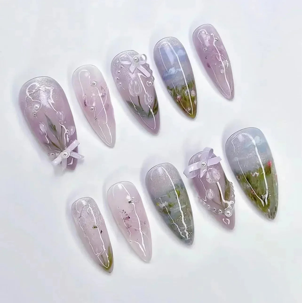 Almond shaped false nails with glue