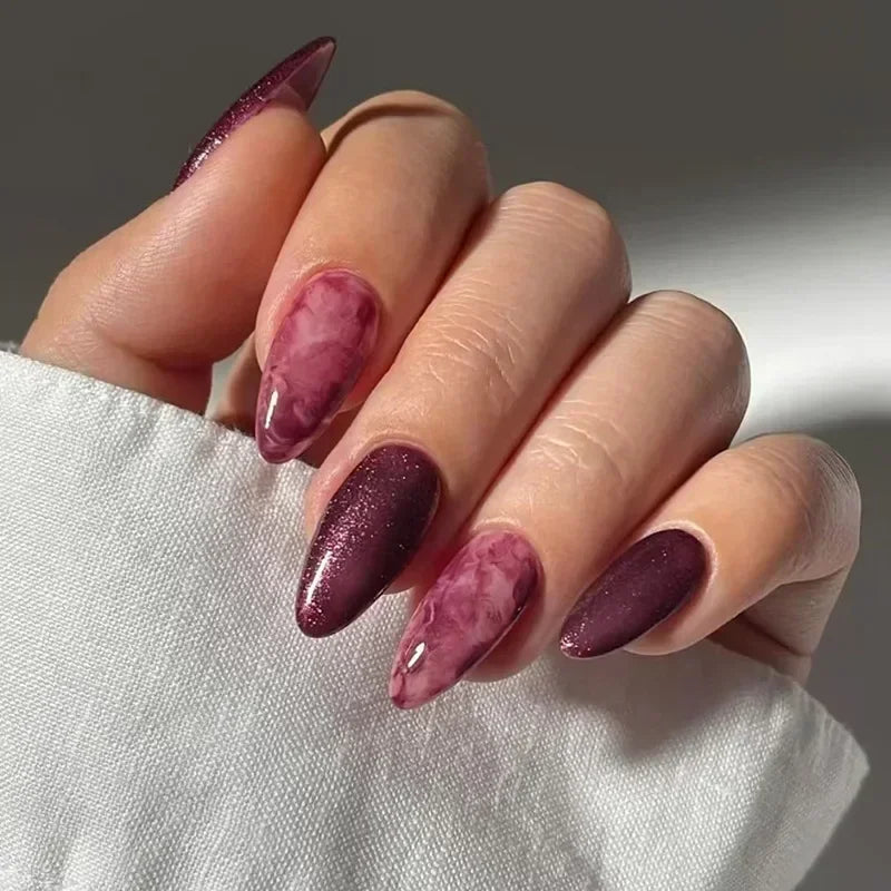 Almond shaped false nails with glue