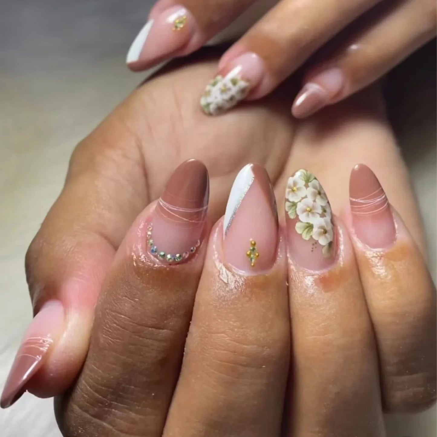 Almond shaped false nails with glue