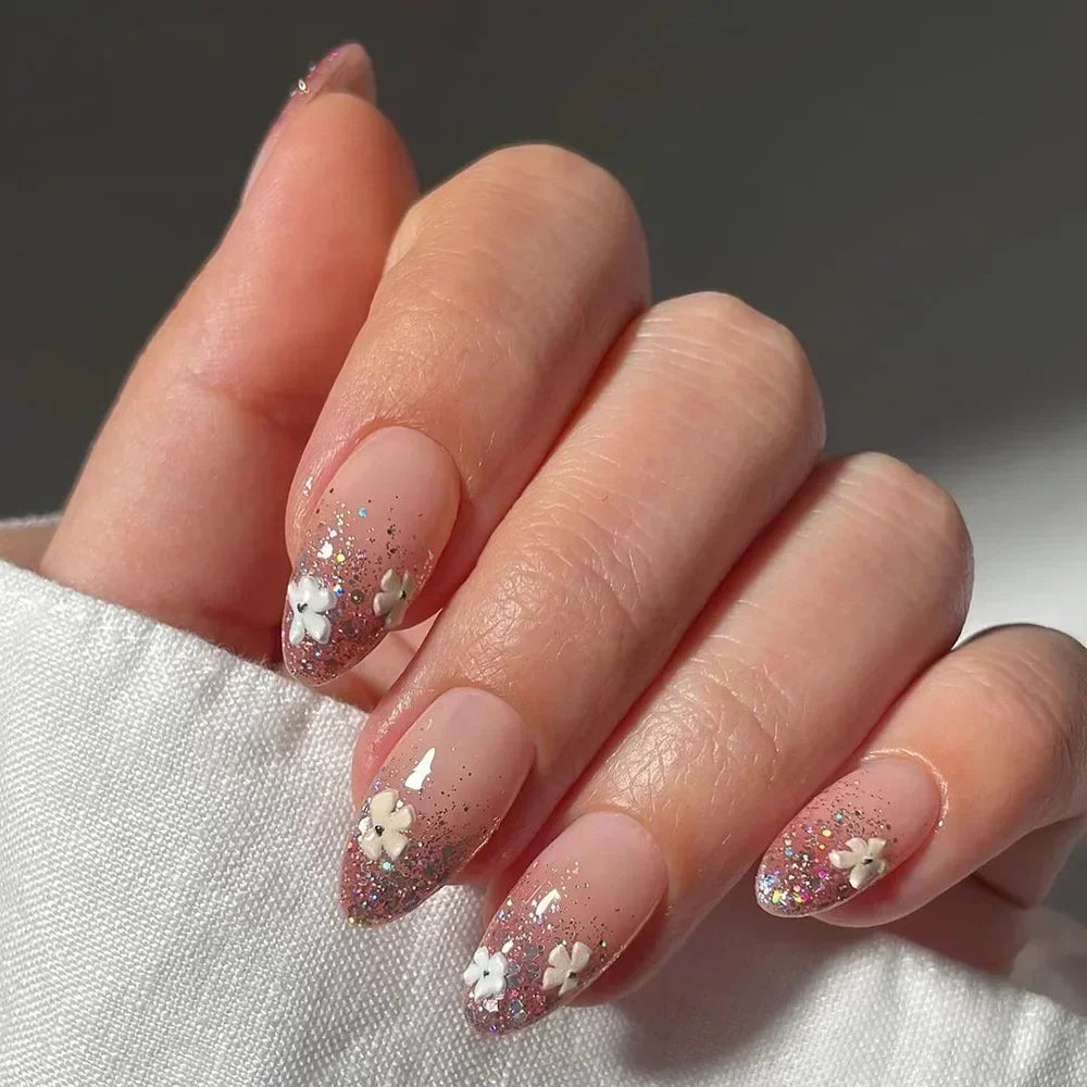 Almond shaped false nails with glue