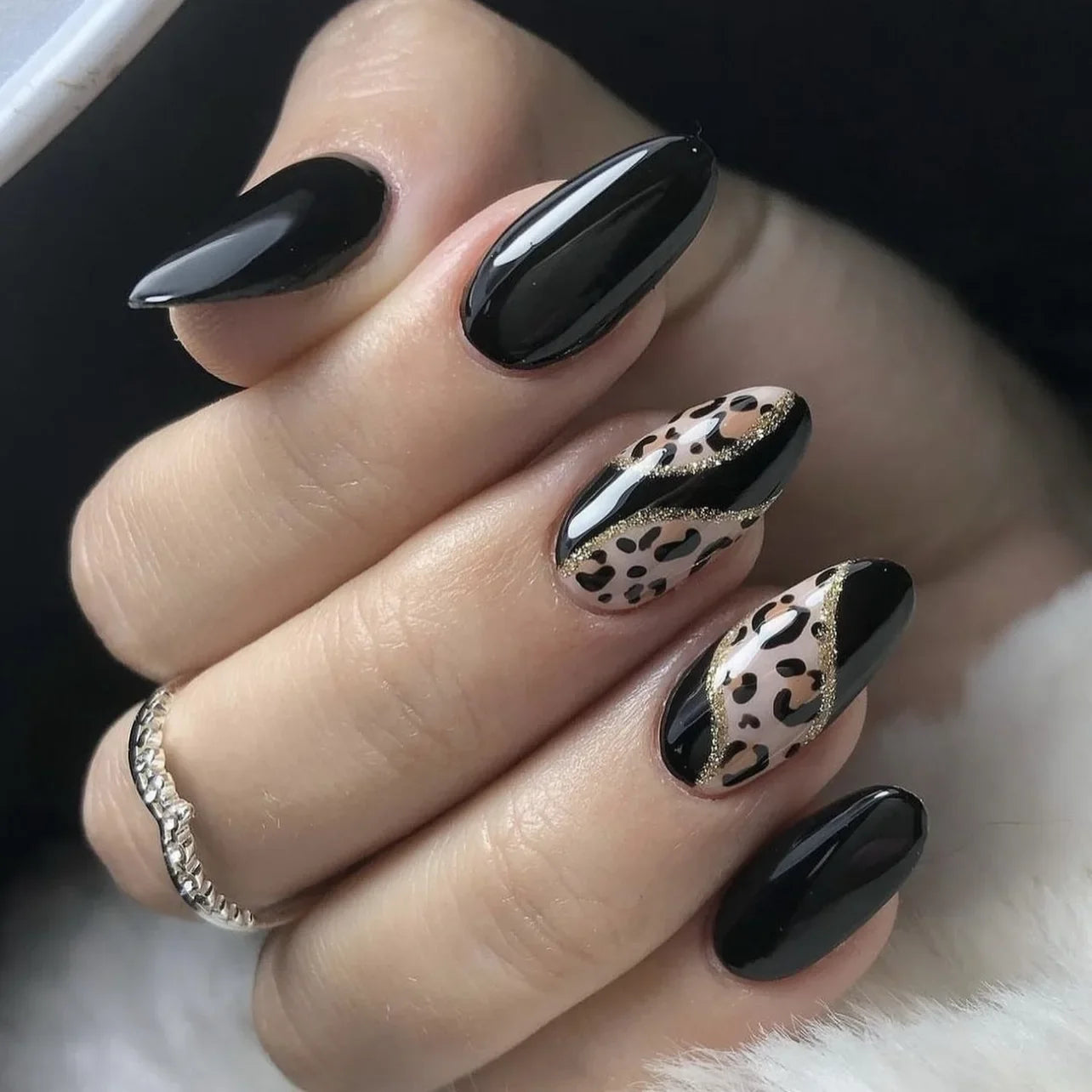 Almond shaped false nails with glue