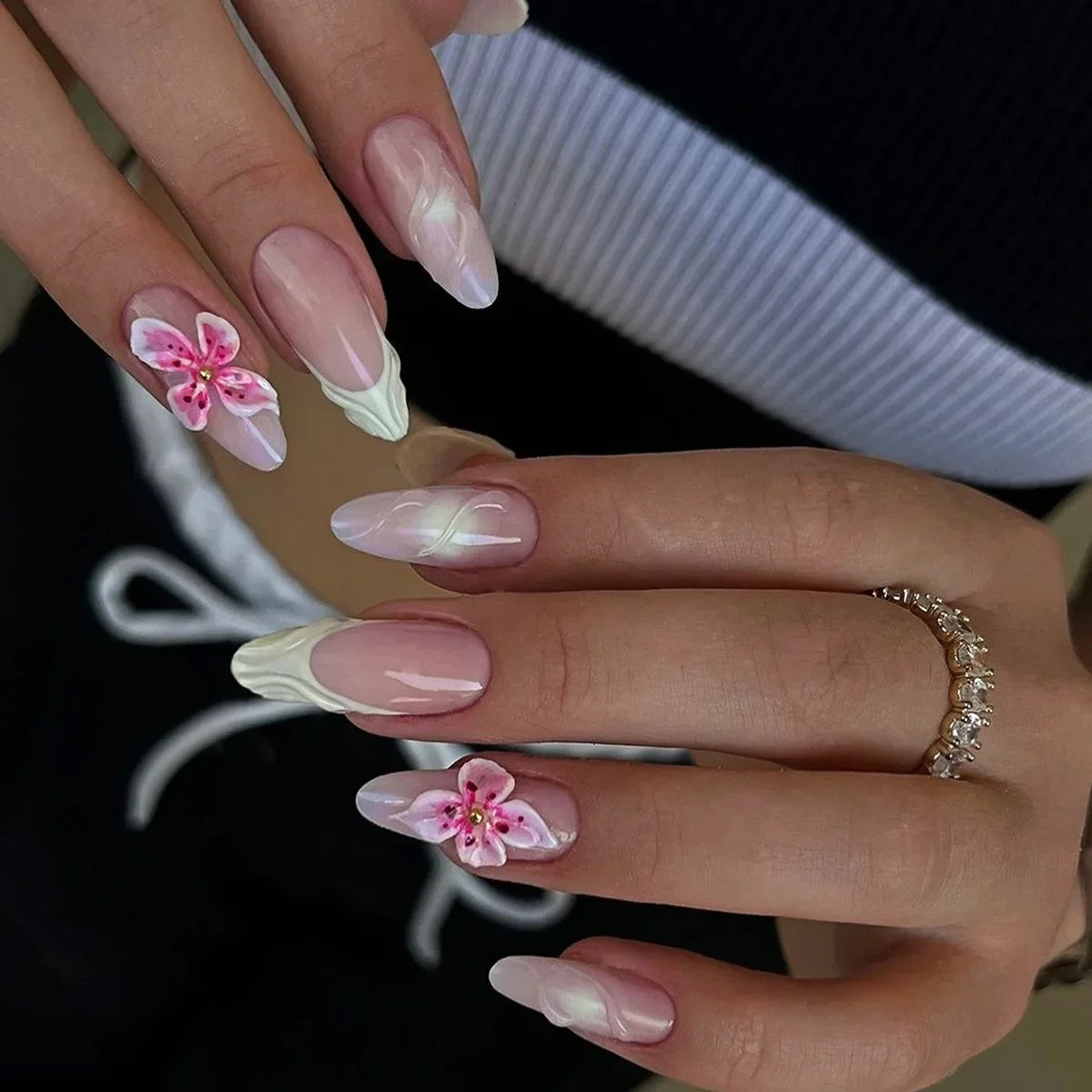 Almond shaped false nails with glue