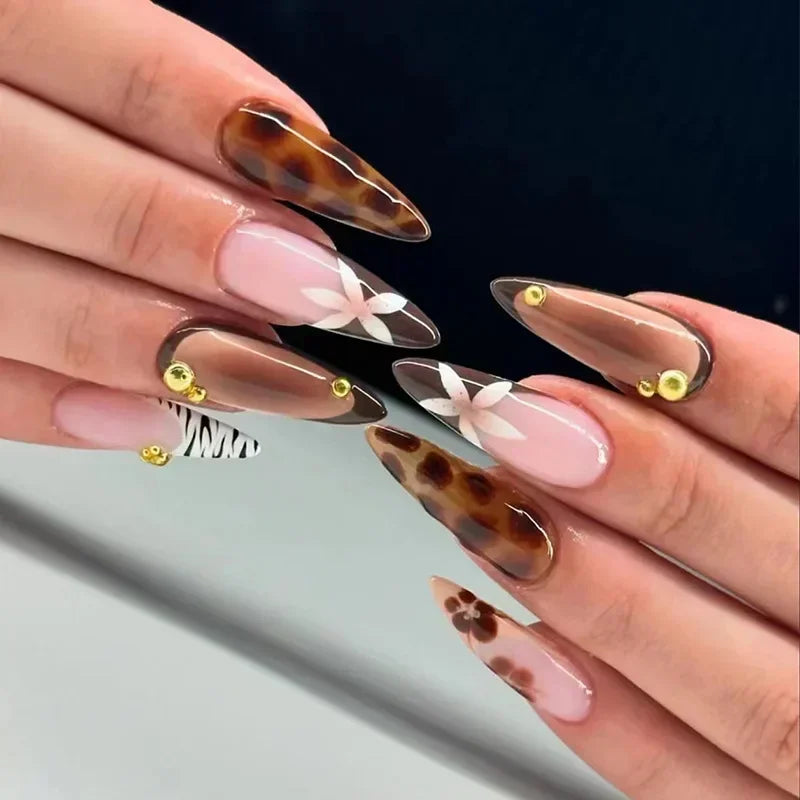 Almond shaped false nails with glue