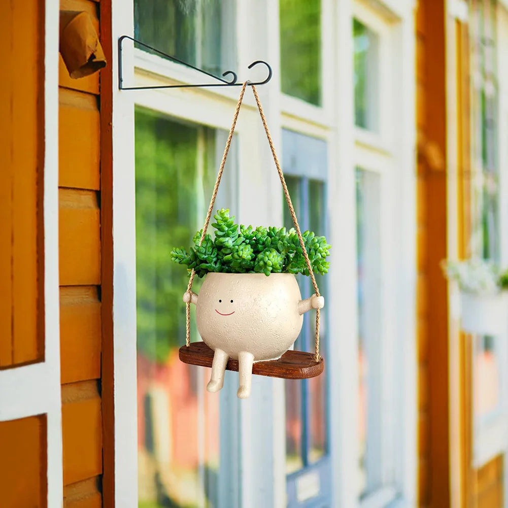 flower pot with smiling face