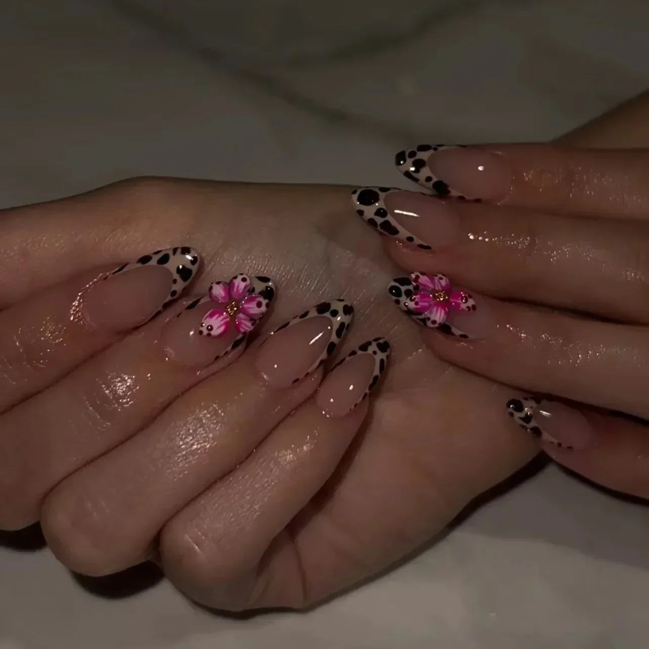 Almond shaped false nails with glue