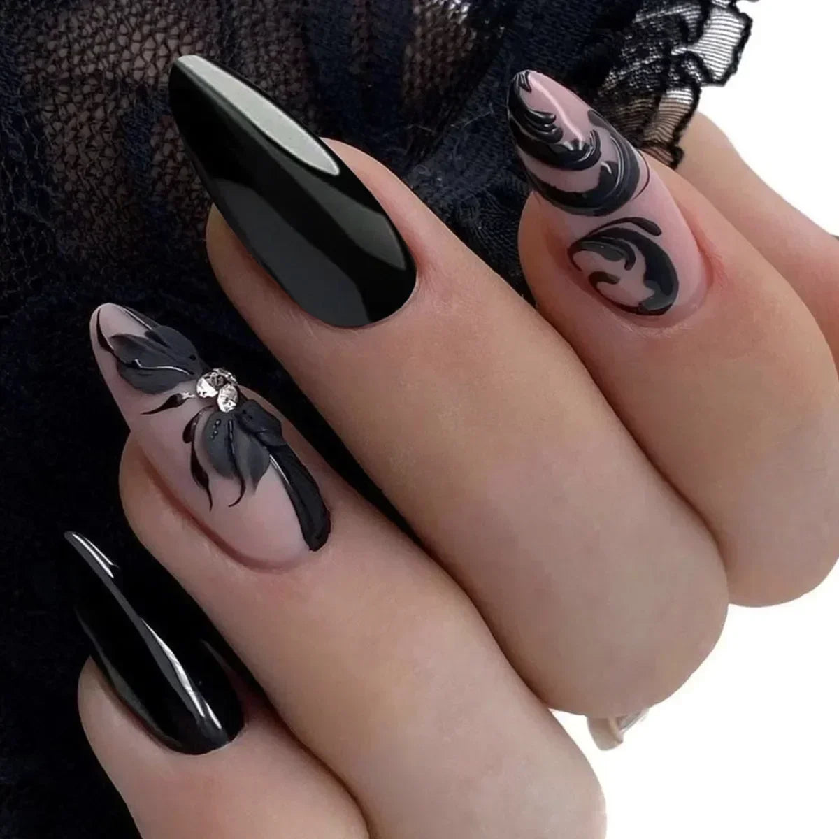 Almond shaped false nails with glue