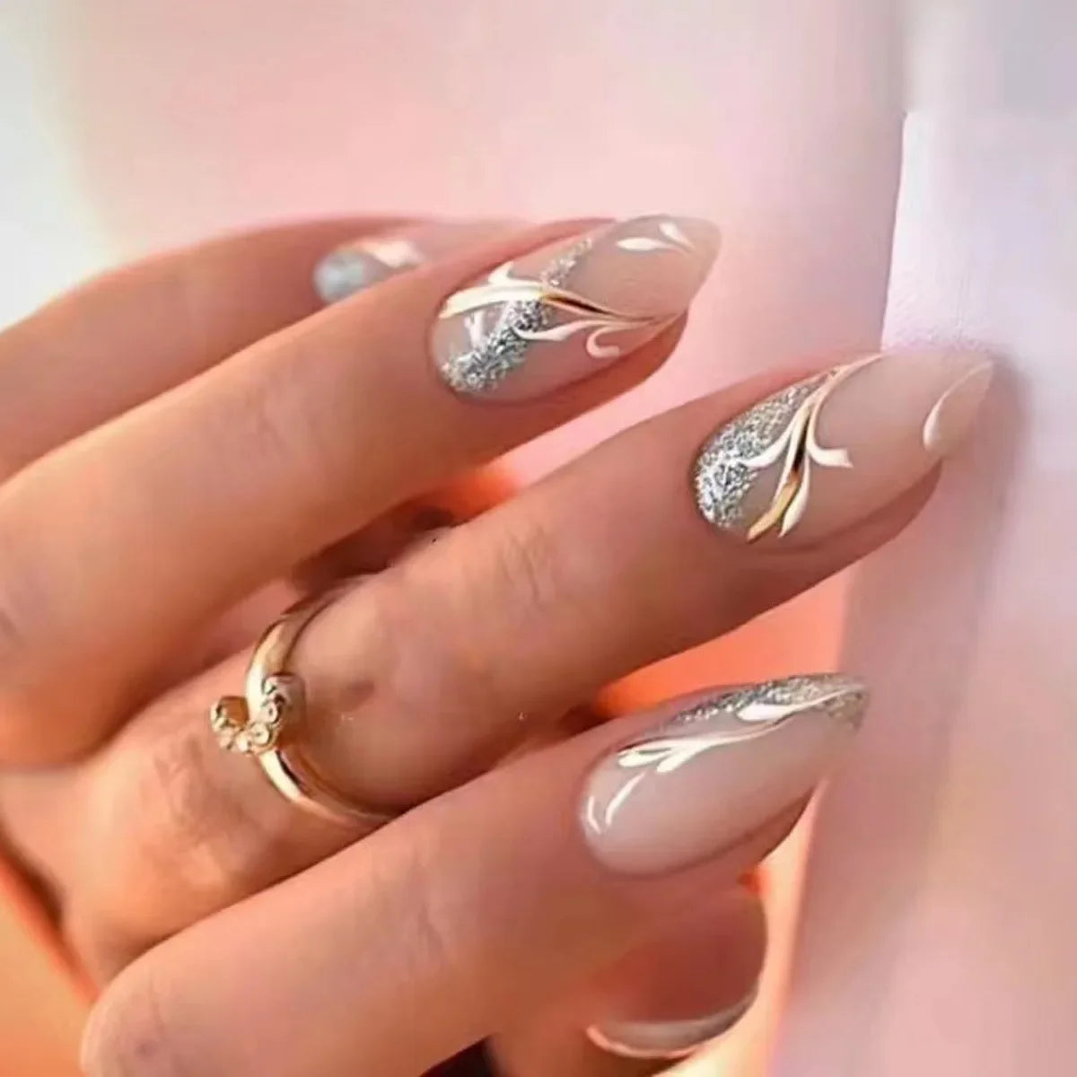 Almond shaped false nails with glue