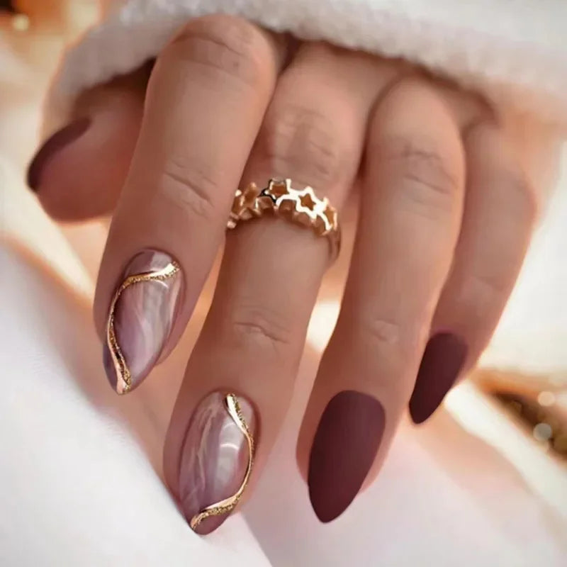 Almond shaped false nails with glue
