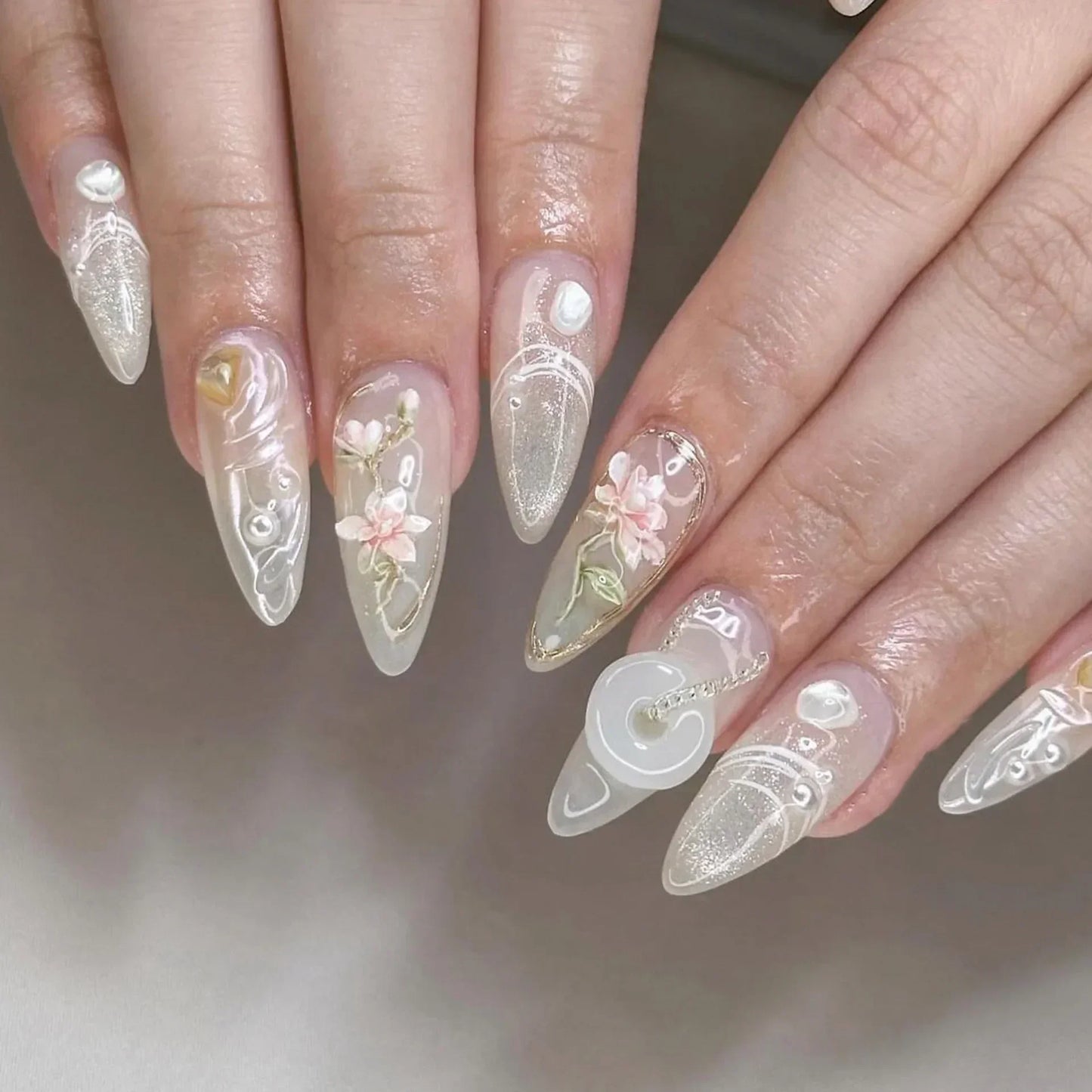Almond shaped false nails with glue