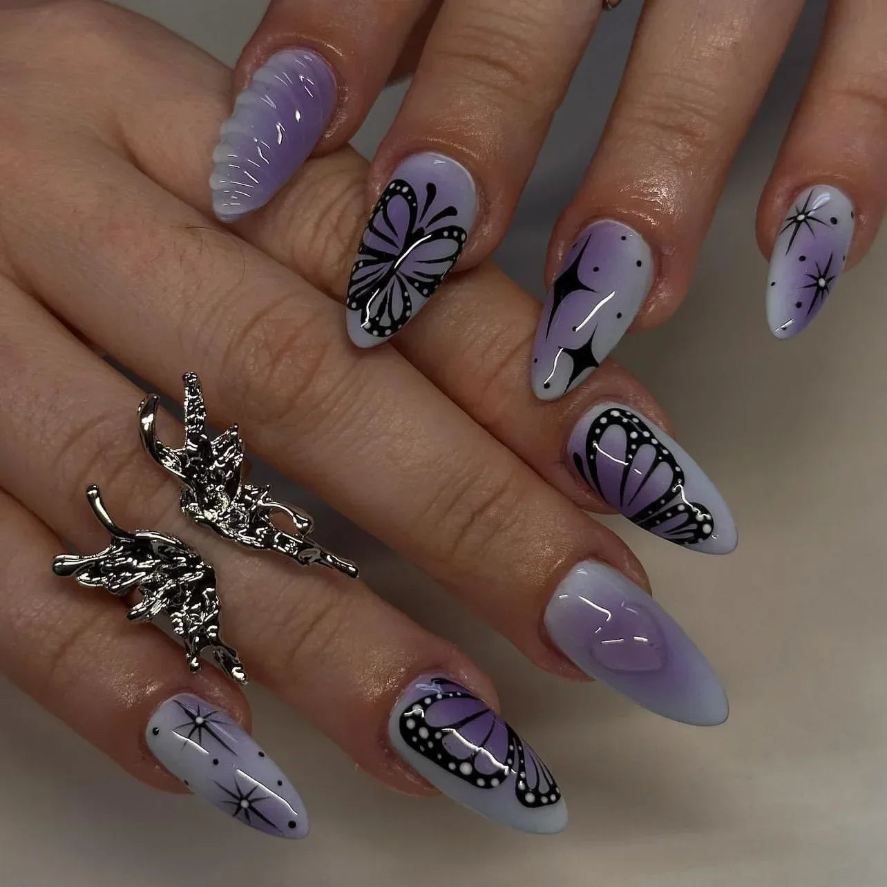 Almond shaped false nails with glue