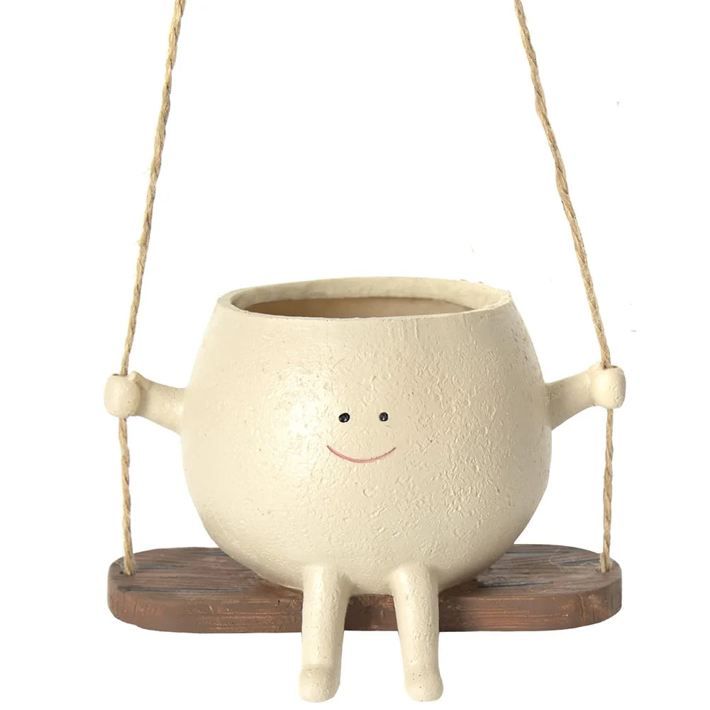flower pot with smiling face