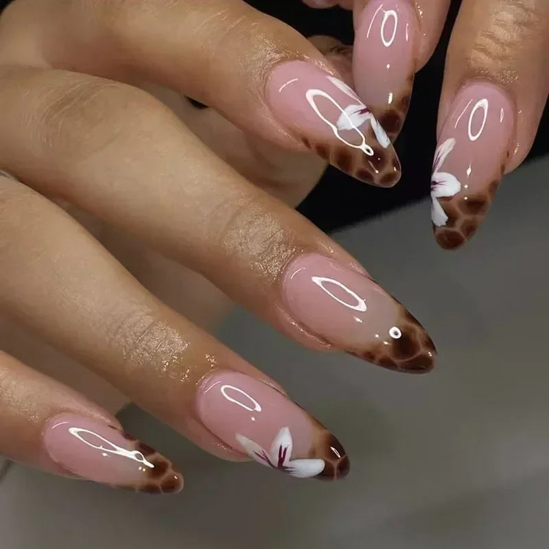 Almond shaped false nails with glue