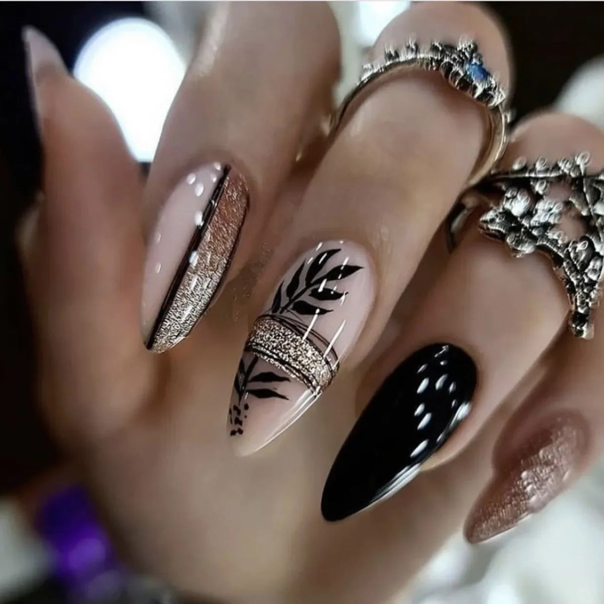 Almond shaped false nails with glue
