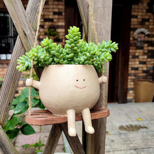 flower pot with smiling face 