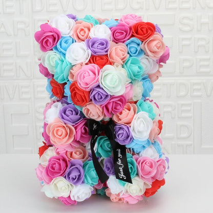 Romantic bear made of artificial roses 