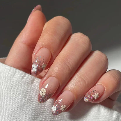 Almond shaped false nails with glue 
