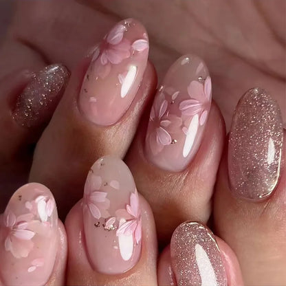 Almond shaped false nails with glue 