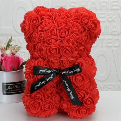 Romantic bear made of artificial roses 